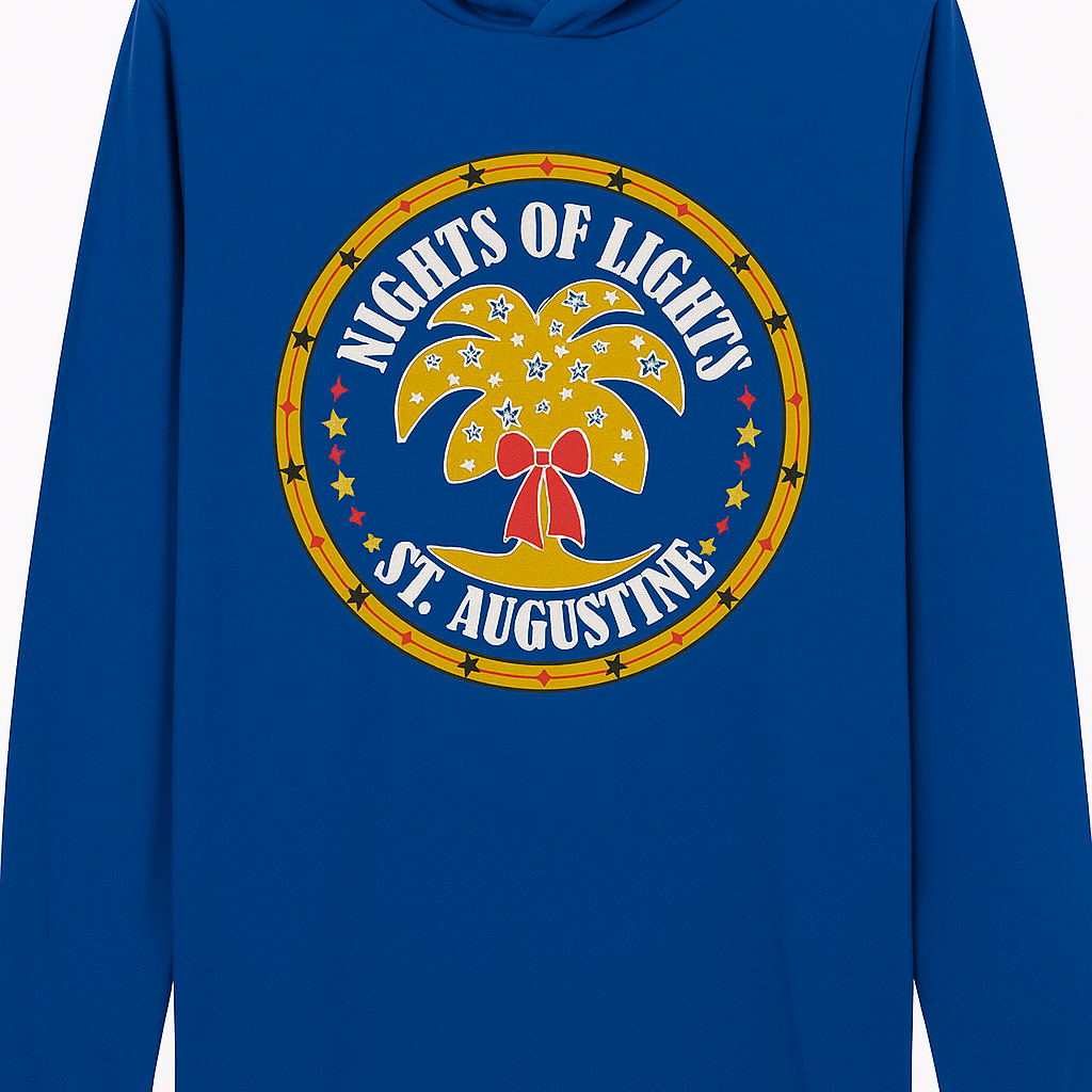 Royal blue long-sleeve hoodie tee featuring a circular “Nights of Lights St. Augustine” palm tree and star design in gold and red tones.