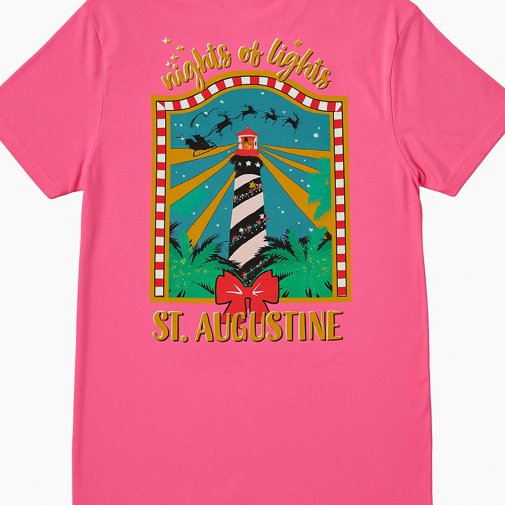 Bright pink short sleeve tee with St. Augustine lighthouse and “Nights of Lights” holiday design in gold and red accents.