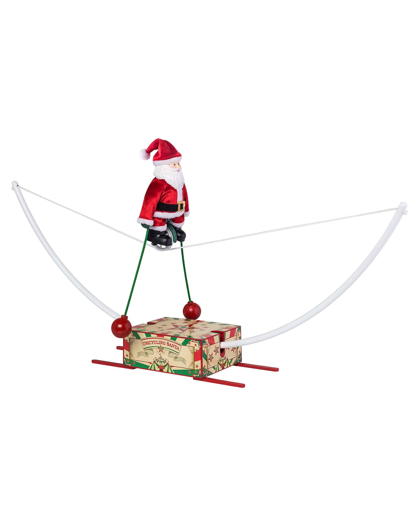 Mr Christmas Unicycling Santa - Artsy Abode
