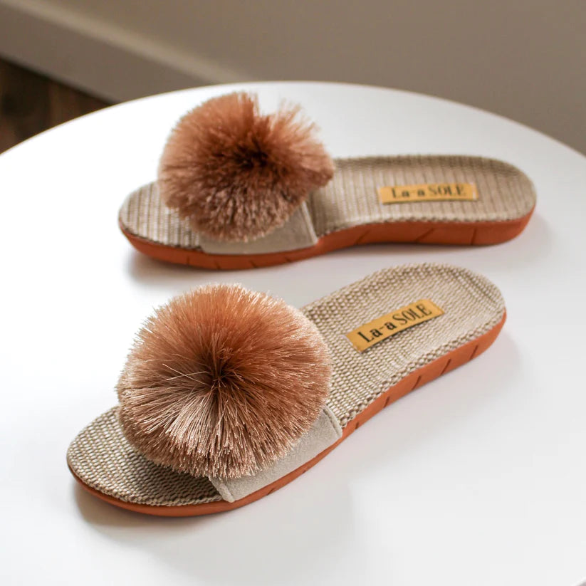 Gold Pom Pom Slide Sandals with playful pom pom and cushioned footbed