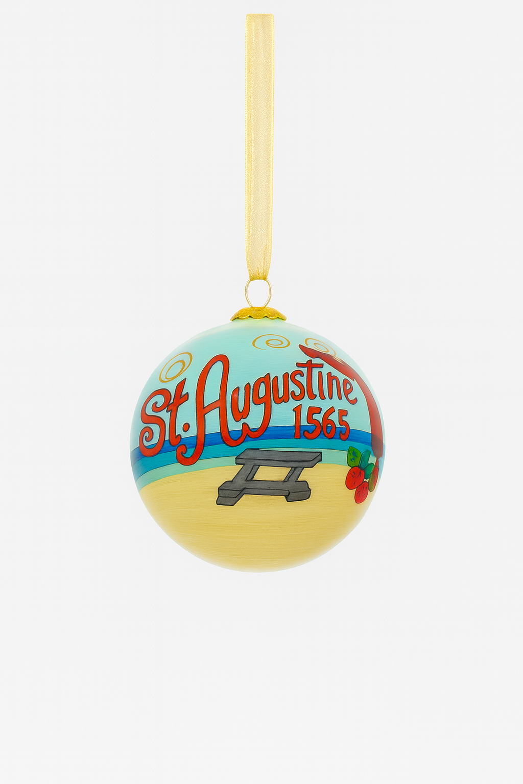 Hand-painted glass Christmas ornament with “St. Augustine 1565” lettering, beach scene artwork, and gold hanging ribbon photographed on a clean white background.