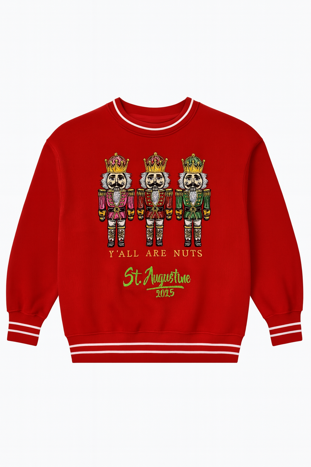 Red holiday sweatshirt featuring three embroidered nutcrackers with the text “Y’all Are Nuts St. Augustine 2025,” accented with white striped cuffs and collar for a festive seasonal look.